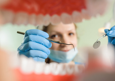 Dentist repairing smile