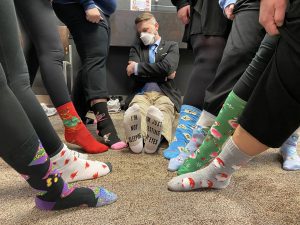 Several Frankel staff members wearing crazy socks.