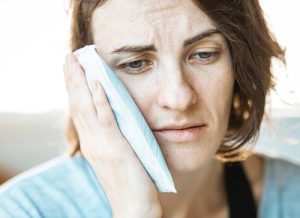 Woman with jaw pain