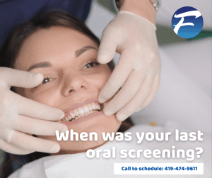 Dentist checking a patient's teeth